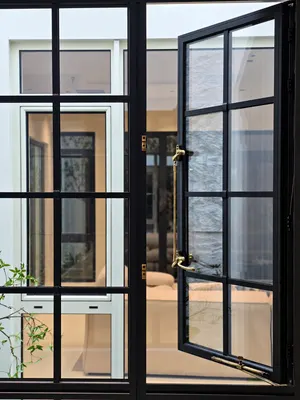 CW02 · Black — Grid glazing · brass-tone hardware