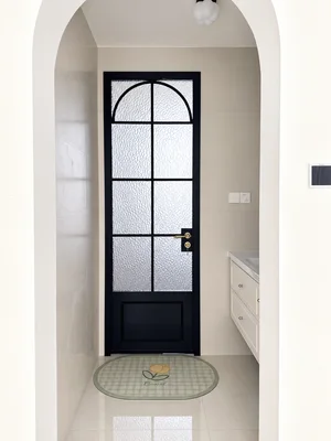 DG09 · Black — Arched grid · textured glass