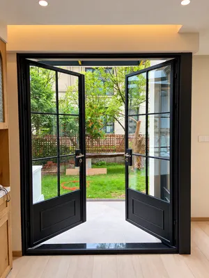 RD10 · Black — Double doors opening to a garden
