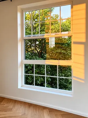 SW10 · White · tall garden-facing window — Style and setting reference
