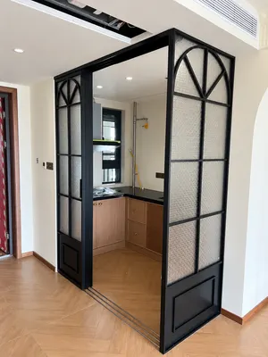 FS10 · Black · fanlight grid and patterned glass — Sliding door style reference